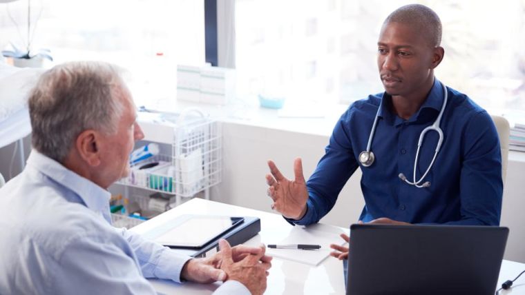 Image of a GP and patient during a consultation